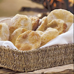 Tortas fritas de zapallo y almíbar