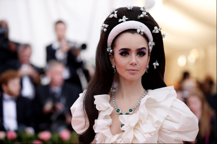 La piel luminosa y de una textura perfecta, el punto destacado del maquillaje de Lily Collins ( REUTERS/Mario Anzuoni).