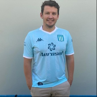El barbijo racinguista de Ginés: quién es el millonario que puso una fortuna como sponsor