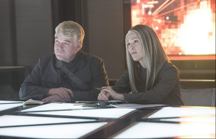 Junto a Julianne Moore en "Los juegos del hambre: Sinsajo - Parte 1", como Plutarch Heavensbee.