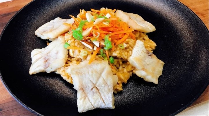 Guillermo Calabrese, Risotto con pescado frito. / Telam