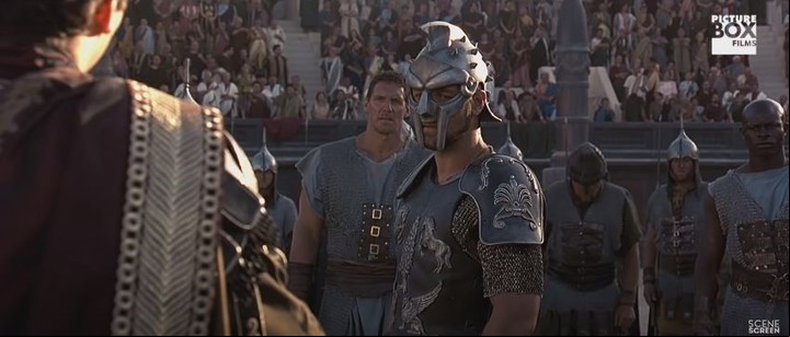 Maximo es enfrentado por Cómodo, quien le pide que se saque el casco.