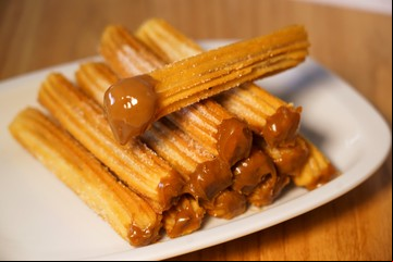 Una legendaria churrería tiene grandes descuentos: sus famosos churros con dulce de leche, pastelera y limón a un precio especial