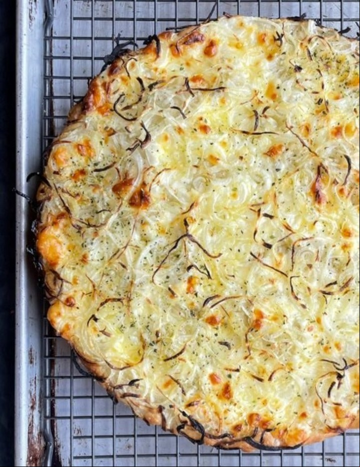Pizza fugazza con queso al molde de Roberto Petersen