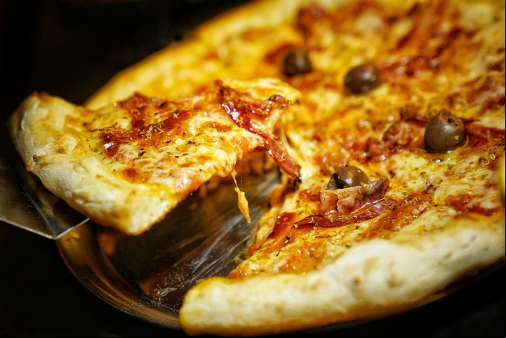 La pizza en homenaje a Il Migliore con panceta y provolone. Foto: Martín Bonetto.